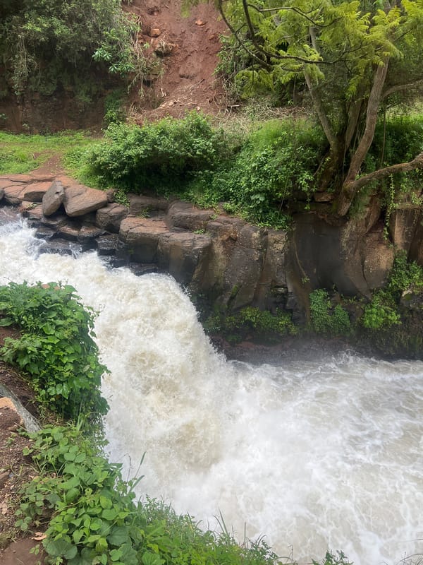 Waterfall captured amid lush vegetation in Nyeri, Kenya