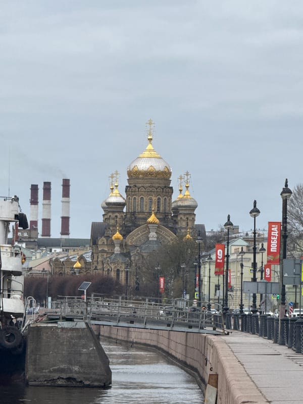 Golden-domed cathedral documented in Saint Petersburg morning scene