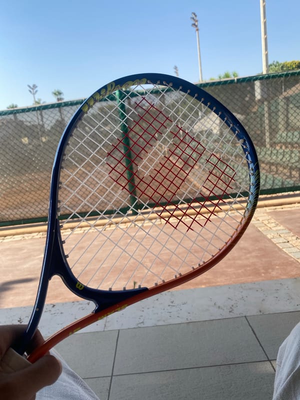 Afternoon tennis session at a clay court in Sheikh Zayed
