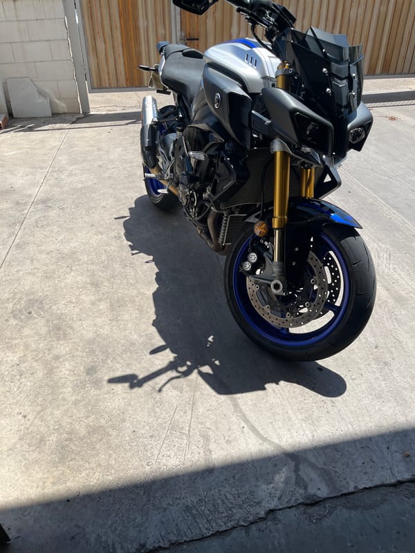 Yamaha motorcycle parked in sunny Xeraco facility