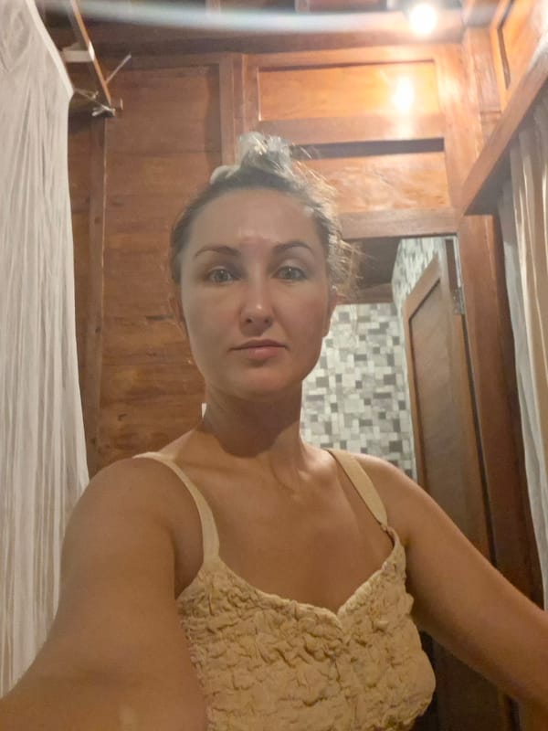 Mixed indoor moments captured in Ubud: selfie, laptop, marine display