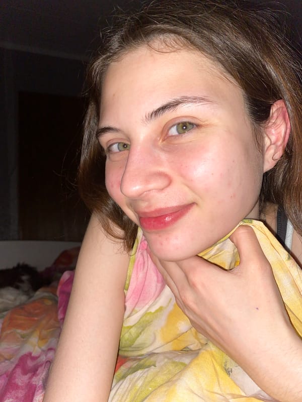Woman poses with dog in intimate portraits in Votkinsk
