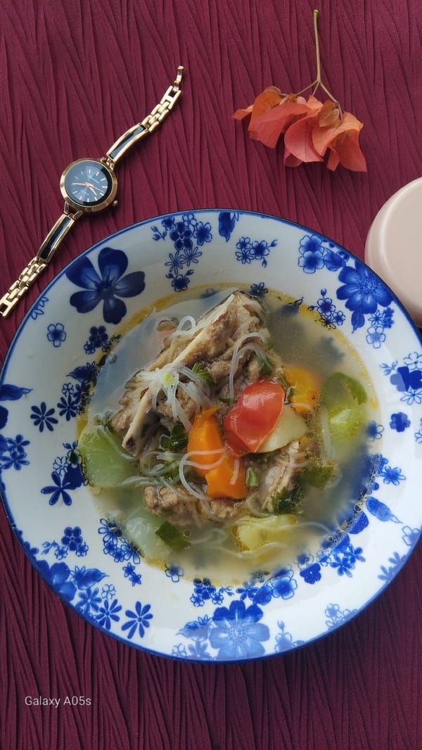 Food, a watch, and backyard plants in rural Indonesia