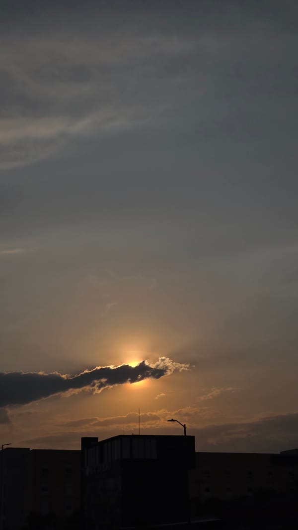 Golden sunlight breaks through clouds over Puebla, Mexico
