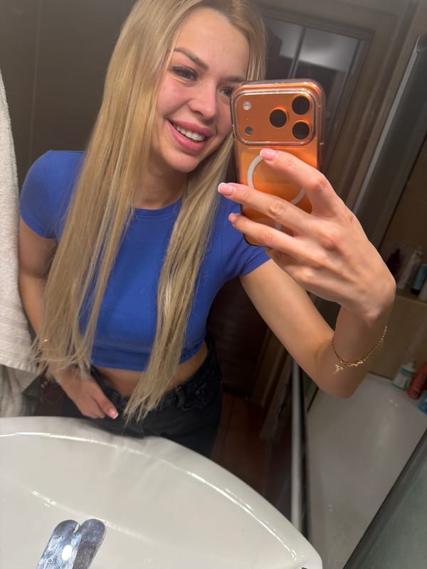 Kyiv rooftop night views and indoor mirror selfies with a poodle