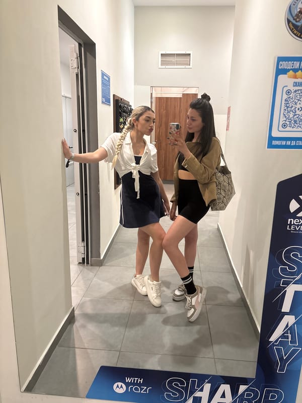 Women visit love lock display in hallway