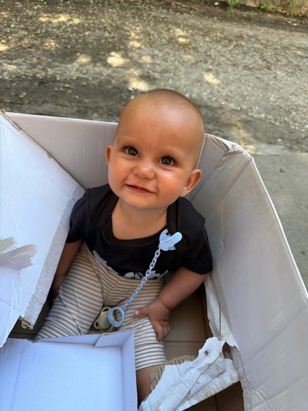 Baby in a cardboard box, Sitovo, Bulgaria