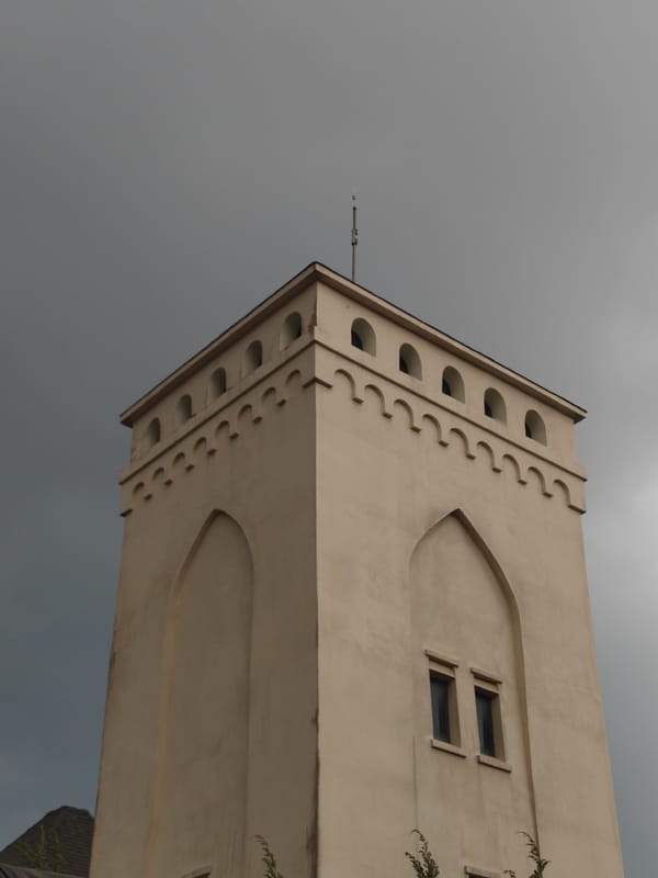 Tower photographed under overcast skies in Phát Chi, Vietnam