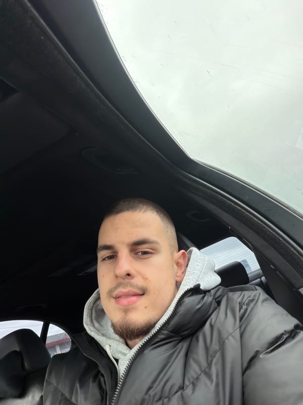 Man sits in car with sunroof in Plovdiv