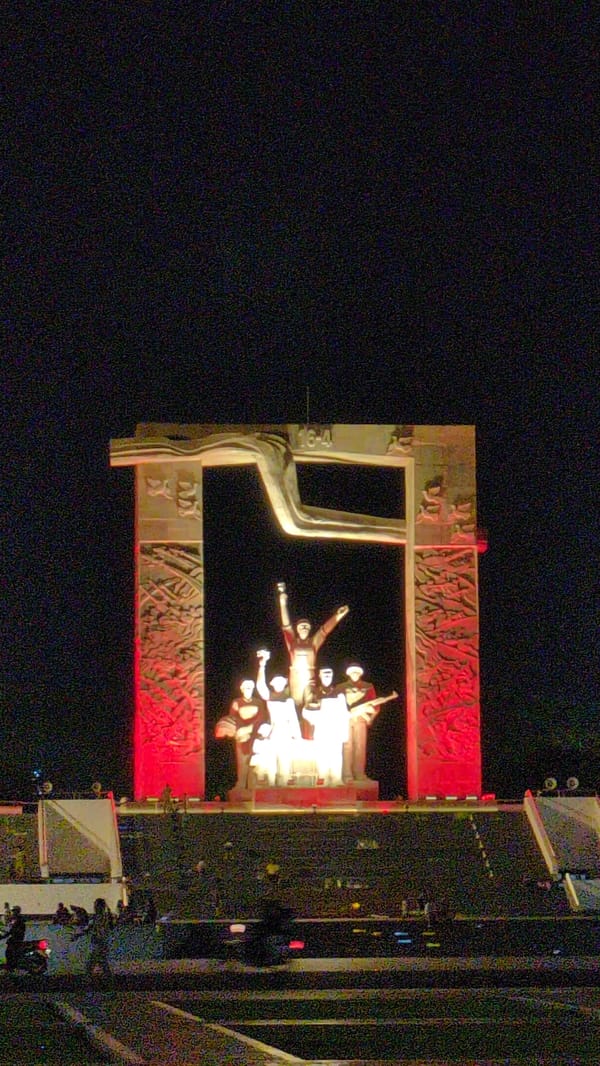 Illuminated monument observed at night in Phan Rang