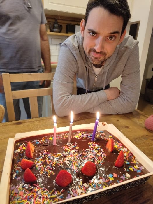 Birthday celebration with chocolate cake documented in Tel Aviv residence