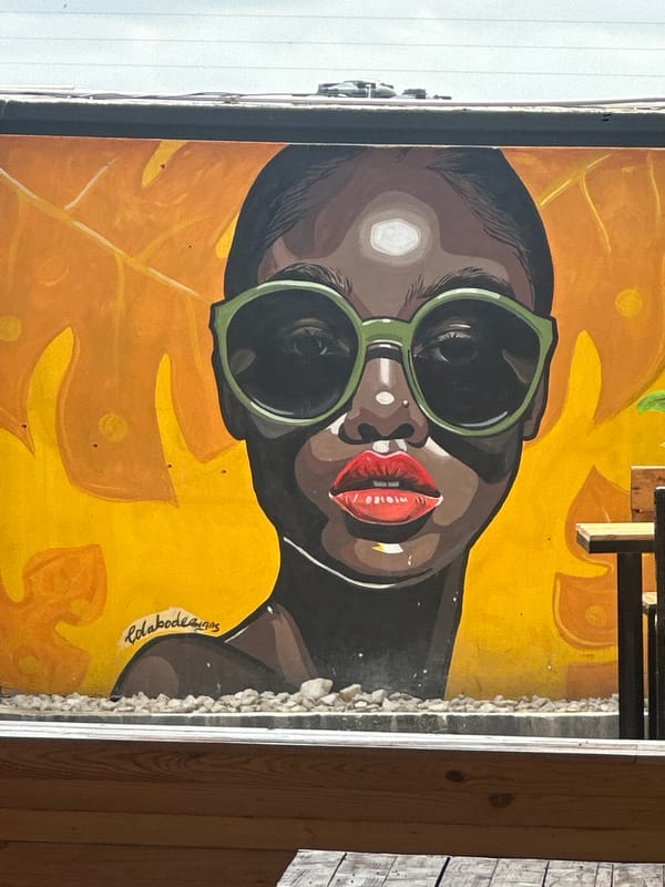 Inside and outside a decorated bar-lounge in Howayi, Nigeria