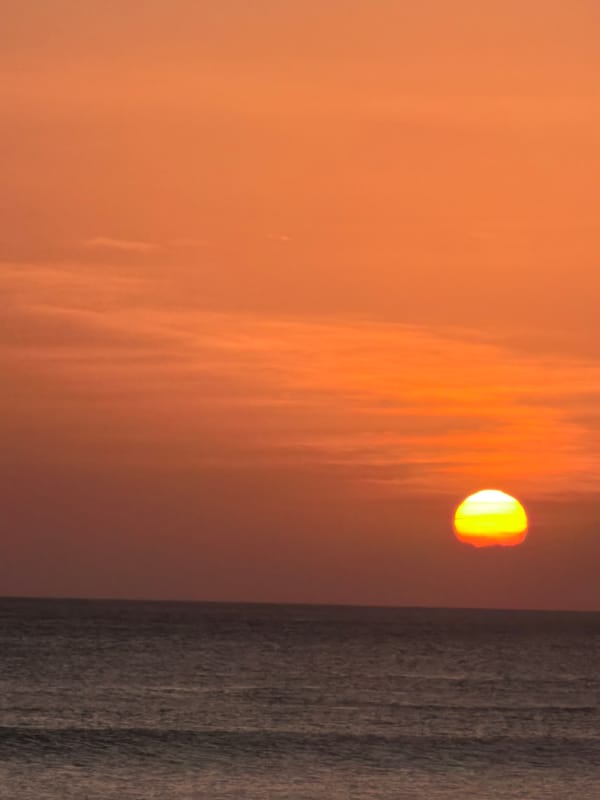 Sunsets, streets, and nightlife across a day in Kuta