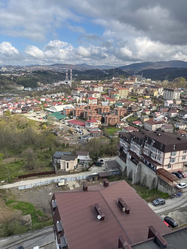 Tourist takes morning selfie overlooking Sochi valley