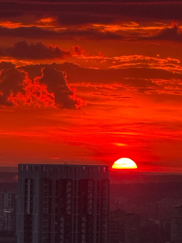 Dramatic sunset over Savenki, Russia with fiery skies