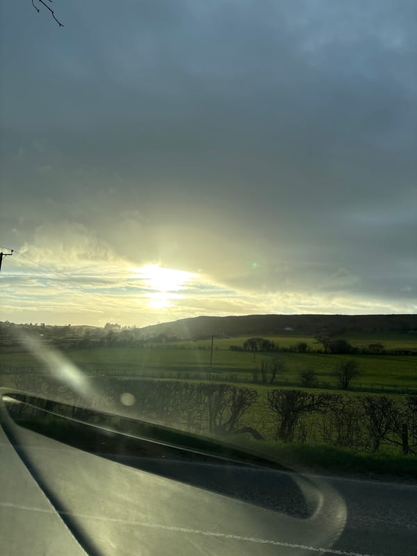 Rural countryside view captured from vehicle near Minsterley