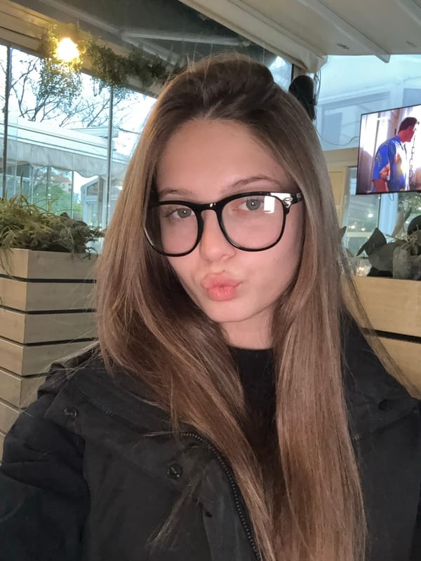 Woman takes pouting selfie in Sandanski, Bulgaria