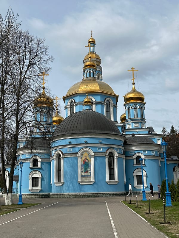 Orthodox church with gold domes observed in Ufa, Russia