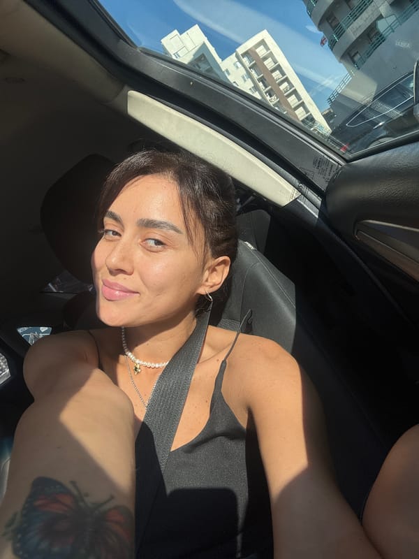 Sunlit moment in a car with open sunroof, Tbilisi