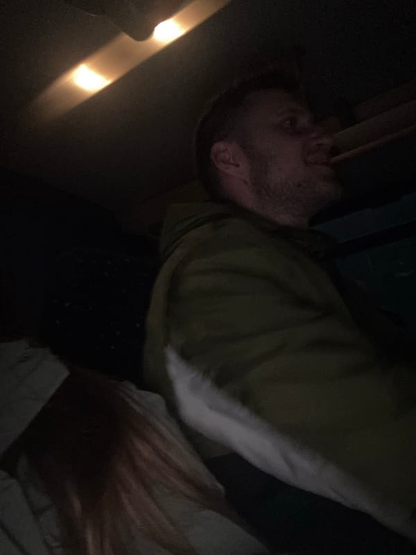 Man resting in dim lighting observed in Łódź