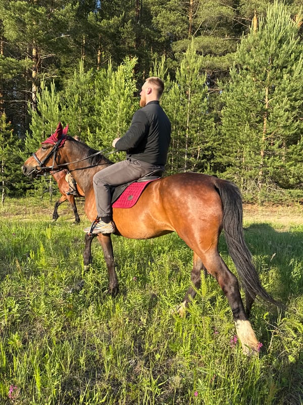 Horseback riders explore countryside near Chaykovsky, Russia