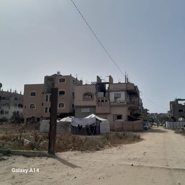 Damaged buildings documented on Nuseirat street, Palestinian Territories