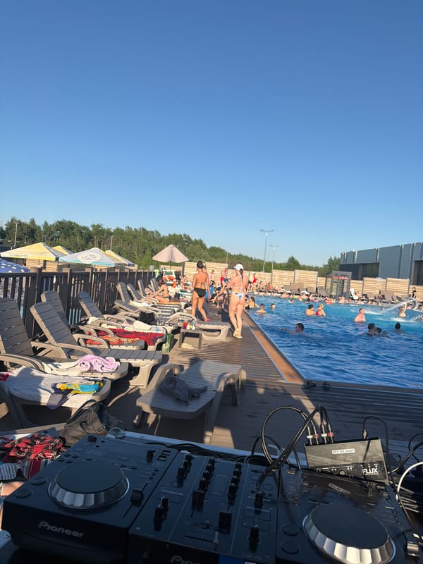 DJ performs poolside at crowded Kazan aquapark
