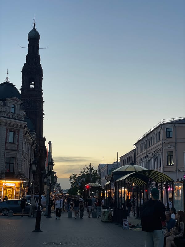 Evening crowds gather near Soyembika Tower in Kazan