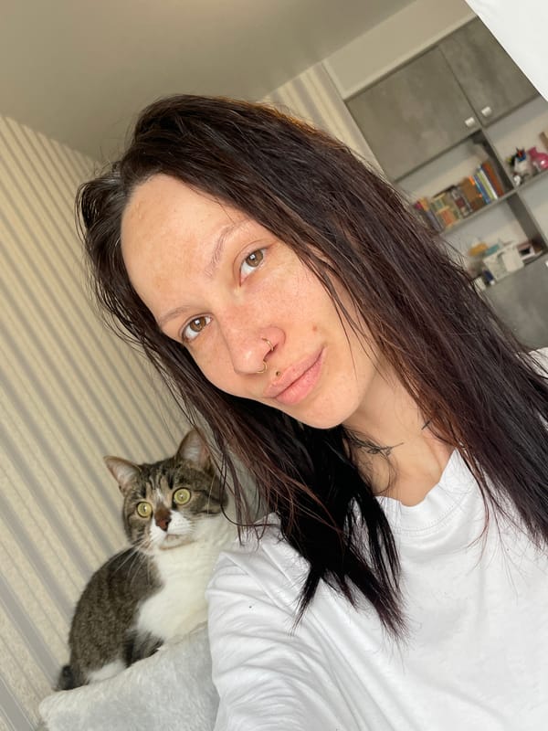 Morning selfie and cat photos captured in Izhevsk home