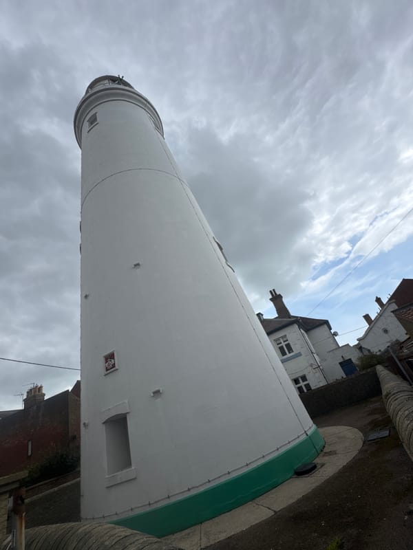 White lighthouse photographed in East Suffolk coastal town