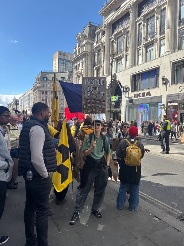 Anti-profit protesters march through central London streets