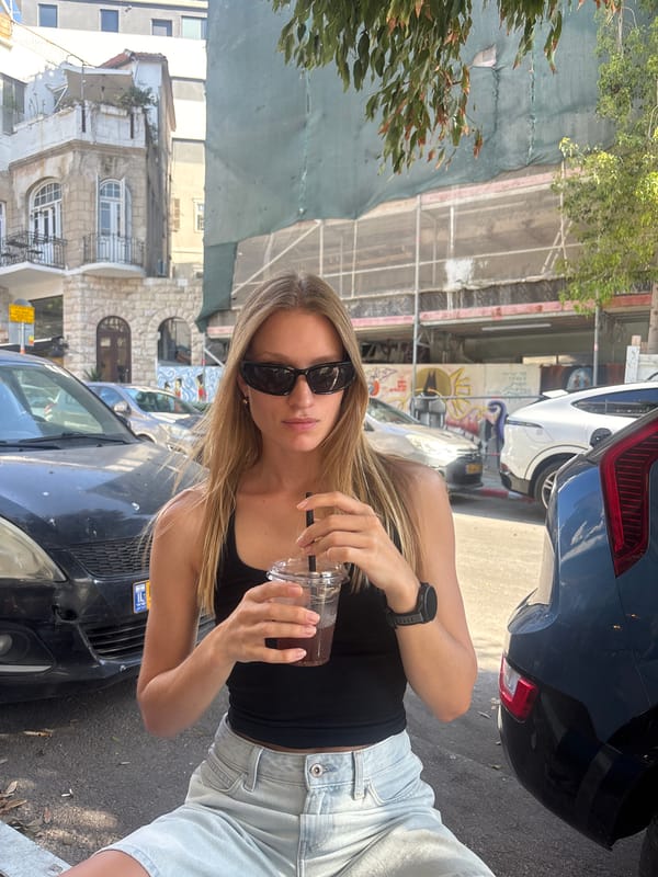 Young women enjoy sunny afternoon in Tel Aviv streets