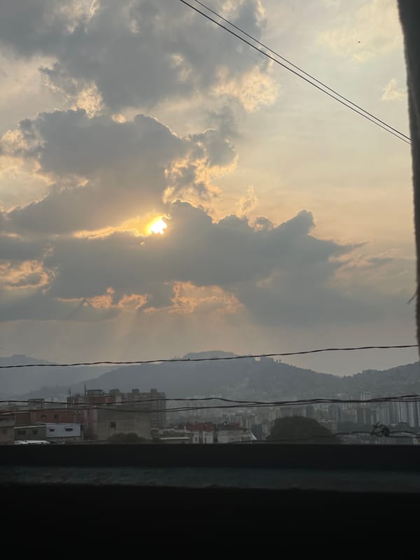 Evening view of Caracas captured through window frame
