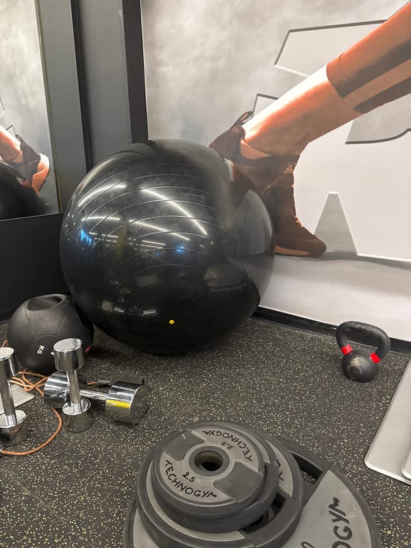 Gym equipment spotted on rubber floor in Sofia fitness facility