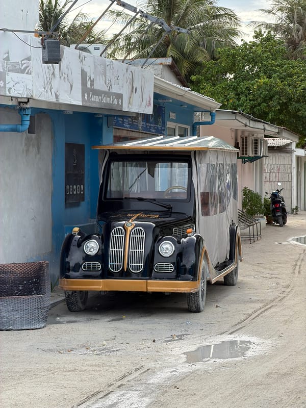 Casual moments captured in Maafushi: vehicle parking, elevator ride