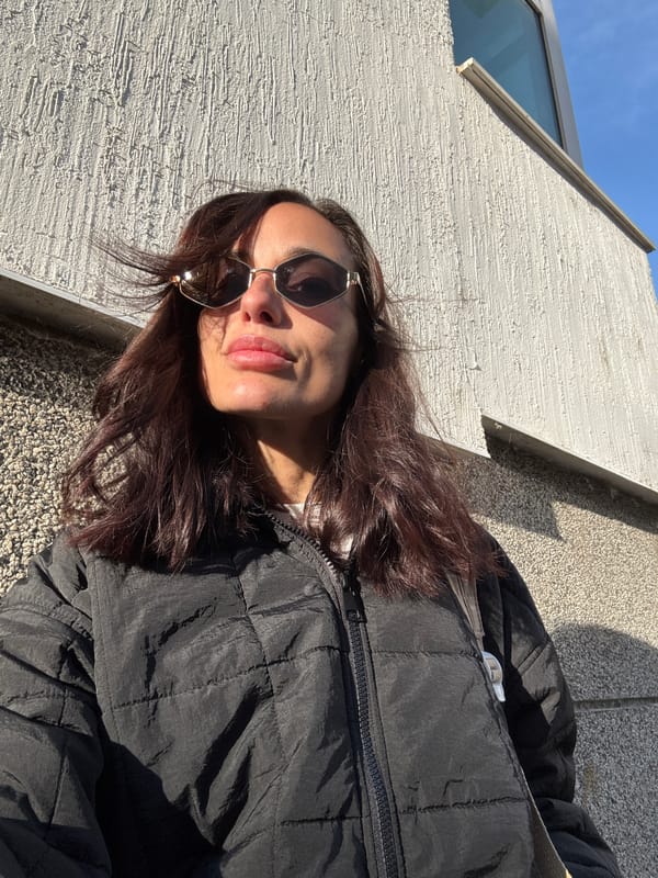 Woman in sunglasses spotted outside building in Pleven
