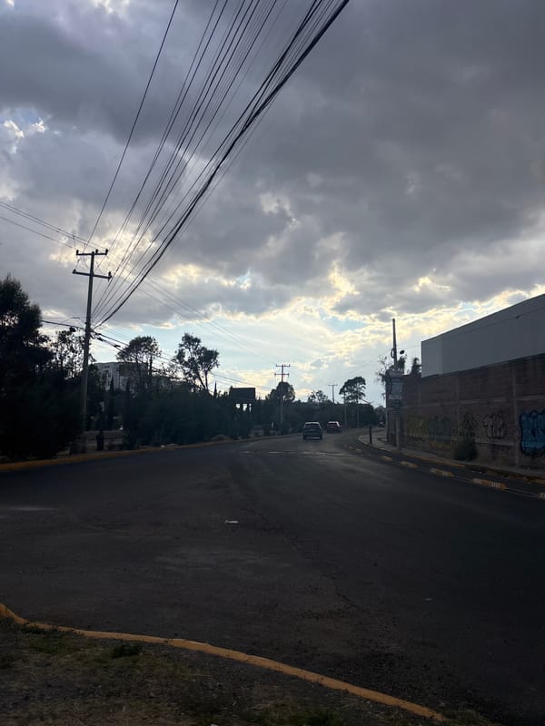 Street scene captured under cloudy sky in San Pedro Cholula