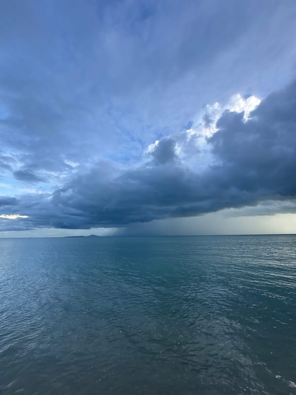 Storm builds over Ban Tai beach on a dramatic overcast morning