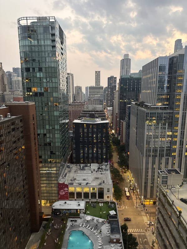 Chicago skyline at dusk, multiple angles under cloudy skies