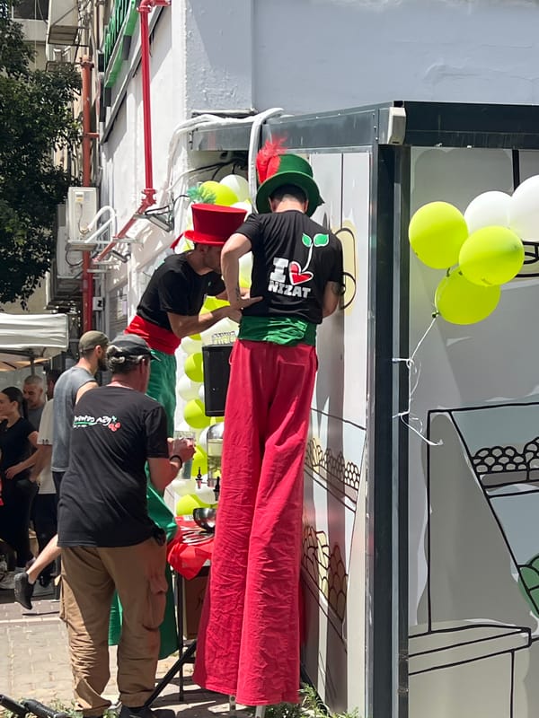 Public gathering observed in Givatayim during sunny Friday morning
