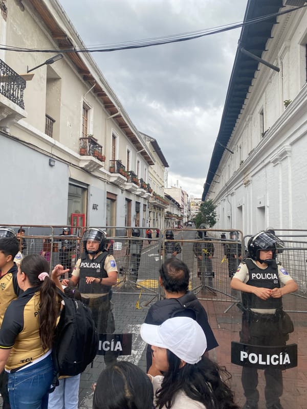 Police deploy as large crowds gather in Quito streets