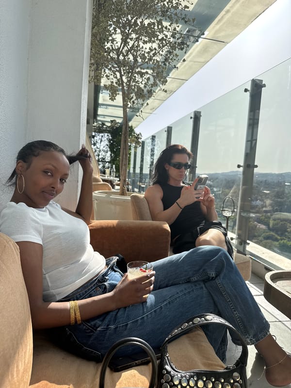 Women relax at West Hollywood rooftop lounge Sunday evening