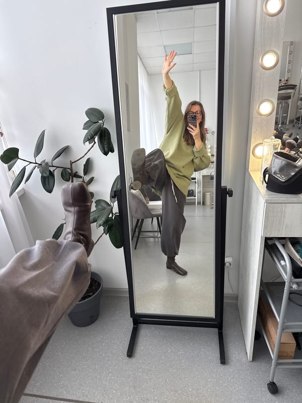 Masked person takes mirror selfie in Izhevsk apartment