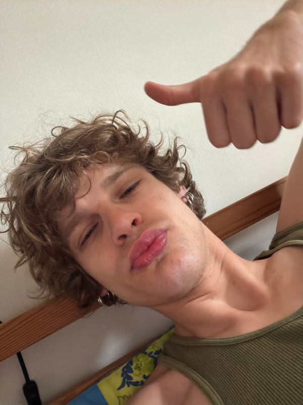 Milan resident displays thumbs-down gesture, shows off Chanel sneaker