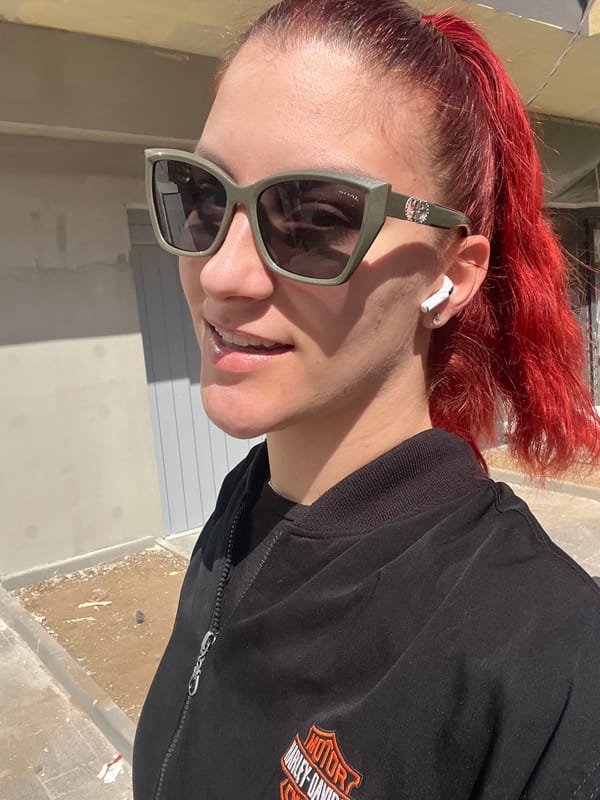 Red-haired person photographed outdoors in sunny Sofia