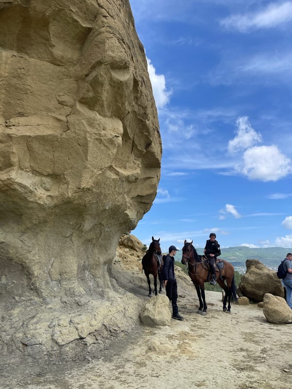 Tourist group explores rocky formations near Мирный, Russia