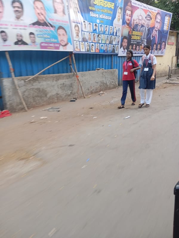 Early morning street activity captured across Mumbai neighborhood