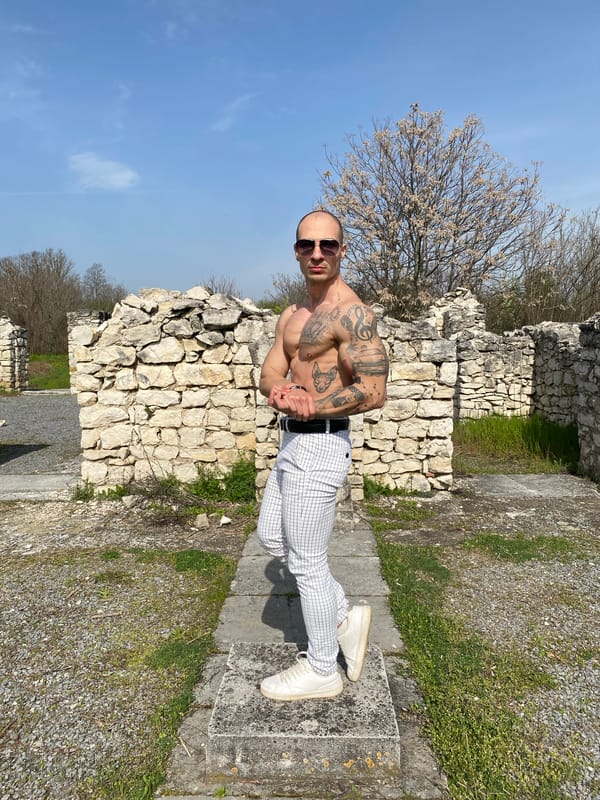 Tattooed man poses for photos in sunny Pleven morning