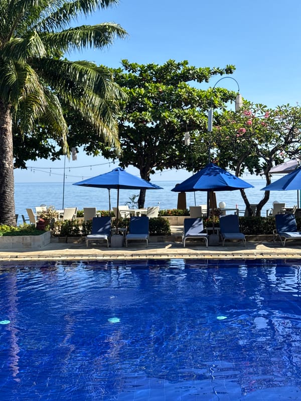 Poolside scene captured at Buleleng resort during early morning hours