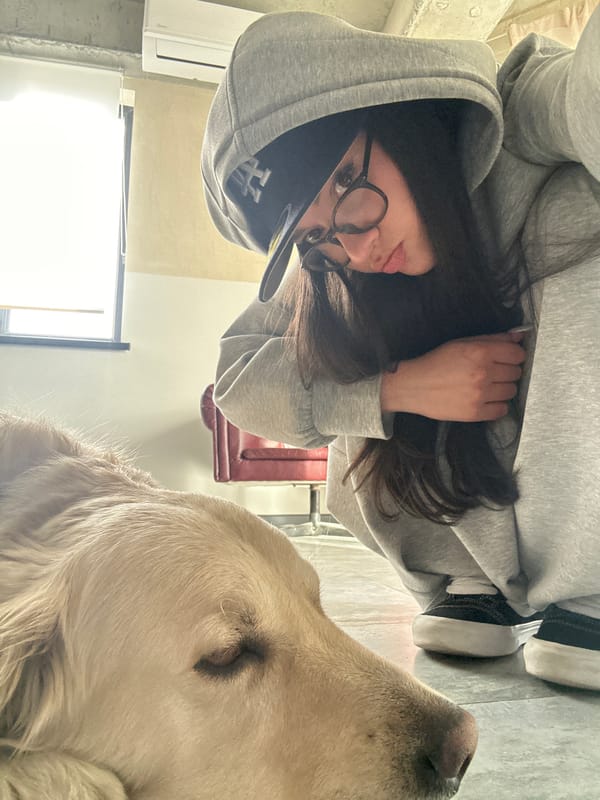 Person and golden retriever documented in casual indoor moments, Armenia
